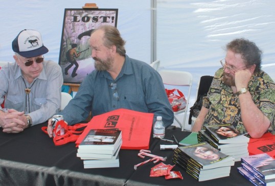 Authors Ken Cable, Larry LaRue and George Cunningham share a moment at a “Meet the Author’s” book signing on Sunday at Canyon Lake Farmers Market. A dozen authors participated in the event, chatting with their readers, building their tribes, and selling signed copies of their books. Some folks were buying for themselves, some as gifts for others, but don’t feel bad if you couldn’t make it. The books are also available on both Amazon and Barnes & Noble – just click the links on the right hand column.